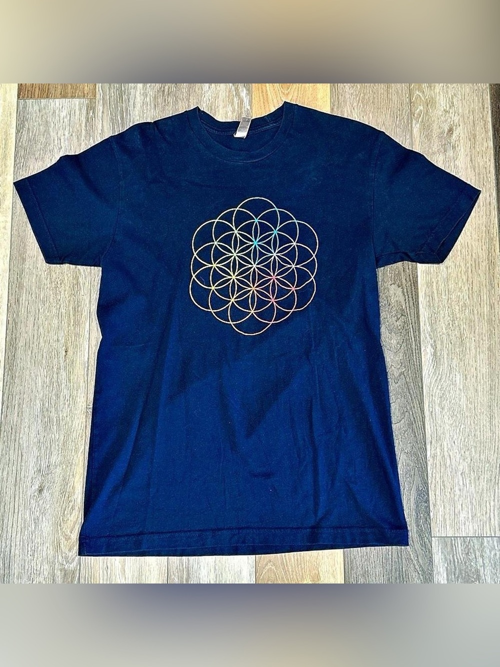 Next Level Apparel Navy Tee with Multicolor Geometric Flower Print